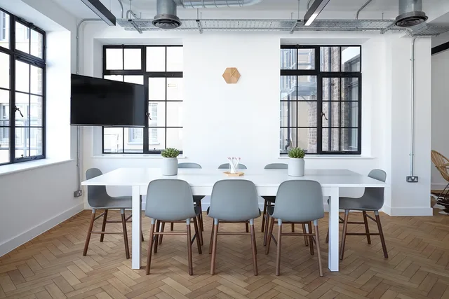 chairs, table, contemporary, furniture, indoors, interior design, office, room, spacious, windows, interior decoration, office furniture, meeting room, boardroom, office, office, office, office, office. A comparison of named social media agencies in Manchester with local pricing and vetting guidance